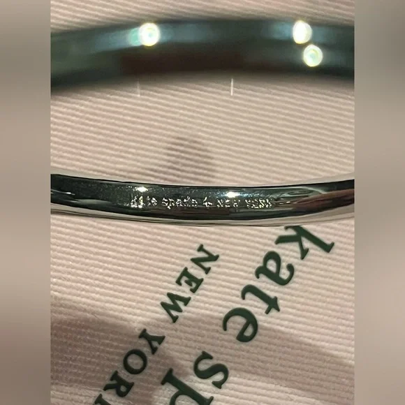 Kate Spade Silver Tone Loves Me Knot Cuff Bracelet NWT and dust bag - Picture 6 of 9